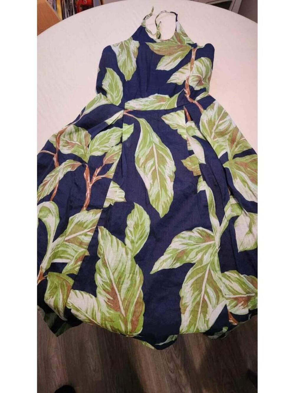 Navy blue tropical leaf print halter neck midi dress